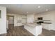 Bright kitchen with granite countertops, a large island, and modern appliances at 3557 Ashridge Way, Conway, SC 29526