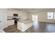 Modern kitchen with stainless steel appliances, granite countertops, and a center island at 3557 Ashridge Way, Conway, SC 29526