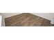 Close-up of pristine wood flooring, highlighting its rich texture and elegant design at 3557 Ashridge Way, Conway, SC 29526