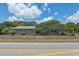 Charming single-story home with brick fence, mature trees and established landscaping at 3907 N Ocean Blvd., Myrtle Beach, SC 29572