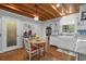 Charming kitchen with wood ceiling, white cabinets, tile backsplash and a breakfast nook at 3907 N Ocean Blvd., Myrtle Beach, SC 29572