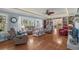 Comfortable living room with hardwood floors, built-in shelves, and plenty of seating at 3907 N Ocean Blvd., Myrtle Beach, SC 29572