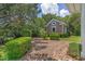 Outbuilding with brick drive and mature landscaping at 3907 N Ocean Blvd., Myrtle Beach, SC 29572