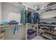 Organized walk-in closet with ample shelving, rods, and storage for clothing and shoes at 3907 N Ocean Blvd., Myrtle Beach, SC 29572