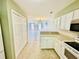 A view from the kitchen showing a pass-through bar and view to living room at 3978 Tybre Downs Circle # 3978, Little River, SC 29566