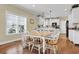 Charming dining area with a spacious table, perfect for Gathering gatherings and entertaining at 421 30Th Ave. S, Sunset Beach, NC 28468