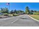 Community entrance with guard house, and American flag at 4554 Fringetree Dr., Murrells Inlet, SC 29576