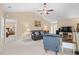 Cozy living room with neutral decor, allowing easy access to the bedroom and outdoor patio area at 4554 Fringetree Dr., Murrells Inlet, SC 29576