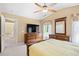 Vaulted main bedroom with a ceiling fan, neutral carpet and en suite bathroom at 4554 Fringetree Dr., Murrells Inlet, SC 29576