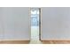 Attic room with light blue walls, and an adjoining room with a round window feature at 469 White Heron Ct. Sw, Sunset Beach, NC 28468