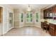 Charming kitchen nook with bay windows and a desk, perfect for casual dining at 469 White Heron Ct. Sw, Sunset Beach, NC 28468