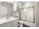 Bright and functional bathroom with a clean white vanity, and shower-tub combination at 4846 Carnation Circle # 301, Myrtle Beach, SC 29577
