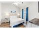 Cozy bedroom with large windows, wooden furniture, and a comfy king-size bed at 4846 Carnation Circle # 301, Myrtle Beach, SC 29577