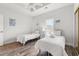 Cozy bedroom featuring twin beds, closet with mirrored doors, and windows with a bright, relaxing atmosphere at 4846 Carnation Circle # 301, Myrtle Beach, SC 29577