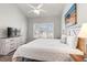 Bright bedroom with natural light, a large window, and a comfortable bed at 4846 Carnation Circle # 301, Myrtle Beach, SC 29577