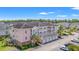Multi-story condo building showcases classic architecture, individual garages, and ample parking in a well-maintained community at 4846 Carnation Circle # 301, Myrtle Beach, SC 29577