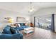 Inviting living area with vaulted ceilings and seamless access to the balcony at 4846 Carnation Circle # 301, Myrtle Beach, SC 29577