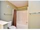 Bathroom featuring a toilet, bath tub, and shower combination with towel rack at 5050 Windsor Green Way # 203, Myrtle Beach, SC 29579