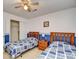 Bedroom featuring two twin beds, a closet, and warm neutral carpeting at 5050 Windsor Green Way # 203, Myrtle Beach, SC 29579