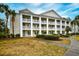 Charming condo building with multiple floors and private balconies at 5050 Windsor Green Way # 203, Myrtle Beach, SC 29579