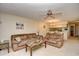 Spacious living room with seating, stylish decor, and access to the dining area at 5050 Windsor Green Way # 203, Myrtle Beach, SC 29579