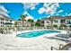 Relax and enjoy the outdoors at this community pool with lounge chairs and umbrellas at 5050 Windsor Green Way # 203, Myrtle Beach, SC 29579