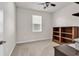 Bright bedroom featuring a ceiling fan, window, and storage space at 520 Cattle Drive Circle, Myrtle Beach, SC 29588