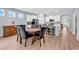 Open dining area features updated flooring and neutral paint with a view to the kitchen at 520 Cattle Drive Circle, Myrtle Beach, SC 29588