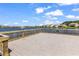Community dock and lake view featuring tranquil waters and charming waterfront homes at 520 Cattle Drive Circle, Myrtle Beach, SC 29588