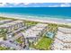 Aerial view of the complex including ocean view, landscaping, and parking at 5601 N Ocean Blvd. # B316, Myrtle Beach, SC 29577