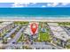 Aerial view of the complex including ocean view, landscaping, and parking at 5601 N Ocean Blvd. # B316, Myrtle Beach, SC 29577