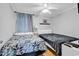 Bright bedroom featuring two twin beds and wood flooring at 5601 N Ocean Blvd. # B316, Myrtle Beach, SC 29577
