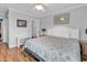 Bedroom with queen bed, TV, and easy access to ensuite bathroom and hallway at 5601 N Ocean Blvd. # B316, Myrtle Beach, SC 29577