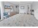Comfortable bedroom with queen size bed, TV, and bathroom entrance at 5601 N Ocean Blvd. # B316, Myrtle Beach, SC 29577