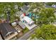 Aerial view of the home highlighting landscaping, detached guest house, and long driveway at 6001-1680 S Kings Hwy., Myrtle Beach, SC 29575