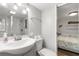 Bathroom with a bright vanity and a shower with glass doors at 6001-1680 S Kings Hwy., Myrtle Beach, SC 29575