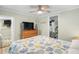 Well-lit bedroom with a ceiling fan and comfortable furnishings at 6001-1680 S Kings Hwy., Myrtle Beach, SC 29575