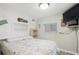 Bedroom with a television, a window and creative decor at 6001-1680 S Kings Hwy., Myrtle Beach, SC 29575