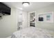 Bedroom with a sliding door to the bathroom and view to another bedroom at 6001-1680 S Kings Hwy., Myrtle Beach, SC 29575