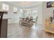 Dining room with lots of natural light and wood-look flooring at 6186 Chadderton Circle, Myrtle Beach, SC 29579