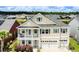 Charming home with a two-car garage, light siding, blue shutters, and a second-story balcony at 6186 Chadderton Circle, Myrtle Beach, SC 29579