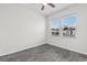 Bedroom featuring a ceiling fan, two windows, and luxury vinyl plank flooring at 623 Harrison Mill St. # 623, Myrtle Beach, SC 29579