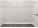 Walk-in closet with wire shelving and luxury vinyl plank flooring at 623 Harrison Mill St. # 623, Myrtle Beach, SC 29579