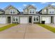 Inviting townhome featuring a one-car garage and well-maintained green space at 623 Harrison Mill St. # 623, Myrtle Beach, SC 29579