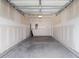 Interior view of an empty two car garage with concrete floor at 623 Harrison Mill St. # 623, Myrtle Beach, SC 29579
