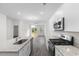 Open kitchen layout with granite countertops and views of a bright dining area at 623 Harrison Mill St. # 623, Myrtle Beach, SC 29579