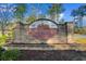 The Forestbrook Estates sign is brick with the community name on an oval inset at 623 Harrison Mill St. # 623, Myrtle Beach, SC 29579
