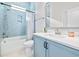 Bathroom featuring a blue vanity, subway tile backsplash, and a shower-tub combination at 6304 Chadderton Circle, Myrtle Beach, SC 29579