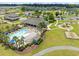 Aerial view showcasing a community pool, clubhouse, and playground amenities, perfect for Gathering fun at 6304 Chadderton Circle, Myrtle Beach, SC 29579