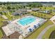 Community pool area featuring lounge chairs, tables, and well-maintained landscaping, offering a relaxing environment at 6304 Chadderton Circle, Myrtle Beach, SC 29579